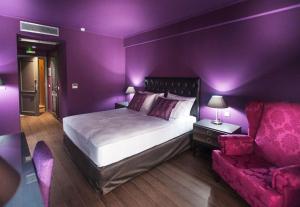 Theasis Hotel Paramythia客房内的一张或多张床位
