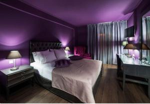 Theasis Hotel Paramythia客房内的一张或多张床位