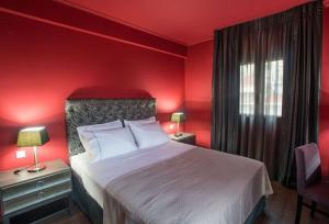 Theasis Hotel Paramythia客房内的一张或多张床位