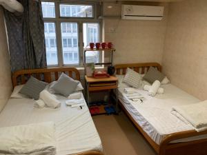 Кровать или кровати в номере 志城住房
