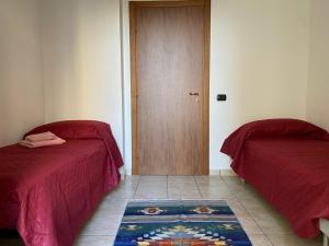 Posteľ alebo postele v izbe v ubytovaní B&B Myrella