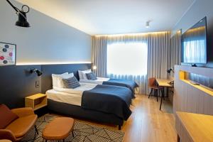Postel nebo postele na pokoji v ubytování Holiday Inn Helsinki - Expo by IHG
