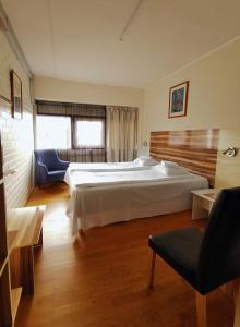 Postel nebo postele na pokoji v ubytování Arkadia Hotel & Hostel