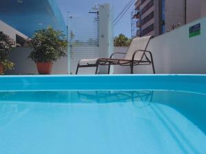 
The swimming pool at or near Coqueiros Express Hotel
