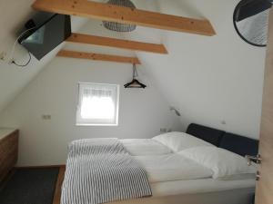 Postel nebo postele na pokoji v ubytování Haus mit Garten Familie Pabst