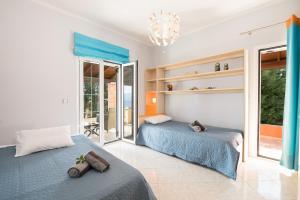 Ένα ή περισσότερα κρεβάτια σε δωμάτιο στο Sea View Estate Helios +42 φωτογραφίες