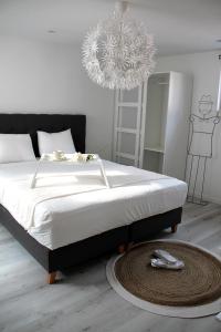 Postel nebo postele na pokoji v ubytování Appartement Blanc cocooning