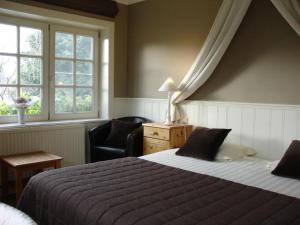 Cama ou camas em um quarto em Gasthof Groenhove