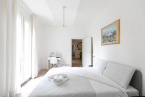 Posteľ alebo postele v izbe v ubytovaní Saragozza Apartments