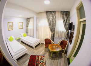 Letto o letti in una camera di Hotel Lula