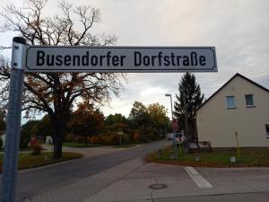 a street sign that reads bombardier daughter daughter cartridge at Quartier 6 in Beelitz