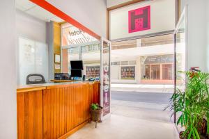 a store front with a counter in a store at Hotel La Estancia in Colima