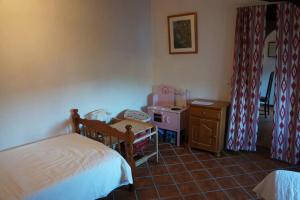 A bed or beds in a room at Ca na Mar: Charming House in the heart of Bunyola, Tramuntana