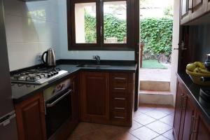 A kitchen or kitchenette at Ca na Mar: Charming House in the heart of Bunyola, Tramuntana