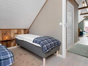 A bed or beds in a room at Holiday home bud II