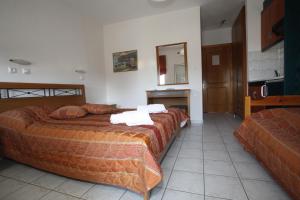 A bed or beds in a room at Badis Haus