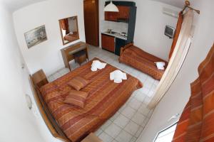 A bed or beds in a room at Badis Haus
