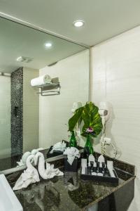 Ein Badezimmer in der Unterkunft Riande Aeropuerto Hotel Casino