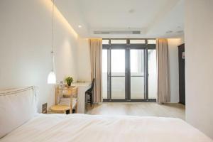 Katil atau katil-katil dalam bilik di Mini West Hotel