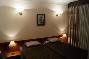 Katil atau katil-katil dalam bilik di Hotel de l' Esplanade
