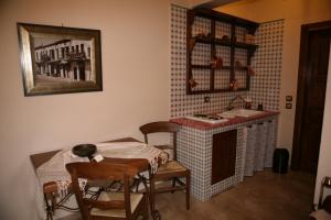 Fotografie z fotogalerie ubytování Roes Suites v destinaci Kato Loutraki + 37 fotografií