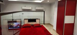 מיטה או מיטות בחדר ב-D&D Guest House & Cafe Syariah