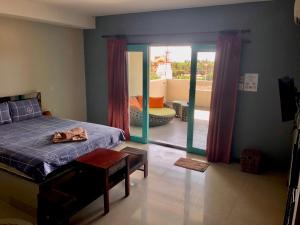 Ένα ή περισσότερα κρεβάτια σε δωμάτιο στο Mui Ne Hills Bliss Hotel