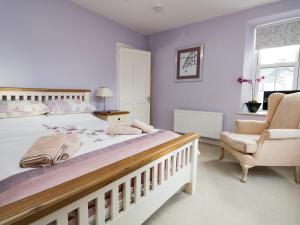 Кровать или кровати в номере Little Brook Cottage
