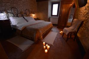 Postel nebo postele na pokoji v ubytování Robur Marsorum Albergo Diffuso