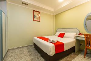 Postel nebo postele na pokoji v ubytování Hotel Fuji