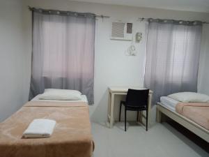 Postel nebo postele na pokoji v ubytování LOC Residence Inn