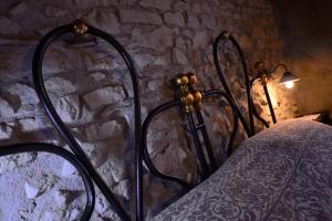 Postel nebo postele na pokoji v ubytování Robur Marsorum Albergo Diffuso