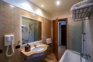Koupelna v ubytování Hotel Le Palme
