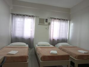 Postel nebo postele na pokoji v ubytování LOC Residence Inn