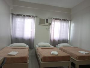 Posteľ alebo postele v izbe v ubytovaní LOC Residence Inn