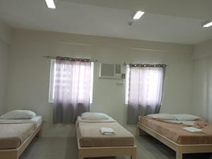 Postel nebo postele na pokoji v ubytování LOC Residence Inn