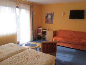 Posezení v ubytování Hotel zur Burg Nürburg