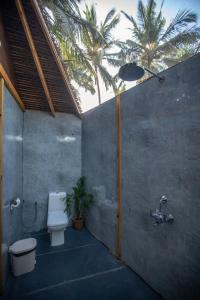 
A bathroom at Goa Cottages Agonda
