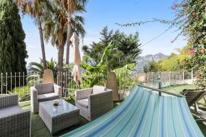 a hammock in the yard of a house at Olguita in Menton