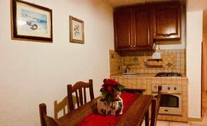 Kuchyň nebo kuchyňský kout v ubytování Wish Rooms Lecce