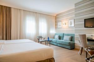 Cama o camas de una habitación en Hotel Opera