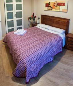 Posteľ alebo postele v izbe v ubytovaní SEVITUR Seville Comfort Apartments