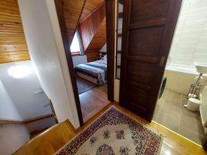 Posteľ alebo postele v izbe v ubytovaní Apartman Őri