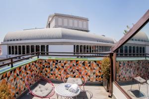 Un balcón o terraza de Hotel Opera