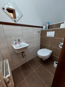 Kúpeľňa v ubytovaní Apartman Őri