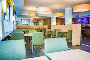 Un restaurante o sitio para comer en Hotel Opera