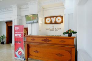a entrance to an event park with an oo sign on the wall at OYO Capital O 514 Omah Pari Boutique Hotel in Yogyakarta