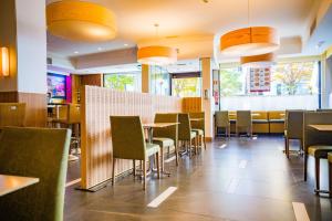 Un restaurante o sitio para comer en Hotel Opera