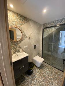 Koupelna v ubytování Nova Apartamenty Rewa + 31 fotografií