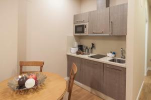 Kuchyňa alebo kuchynka v ubytovaní SEVITUR Seville Comfort Apartments